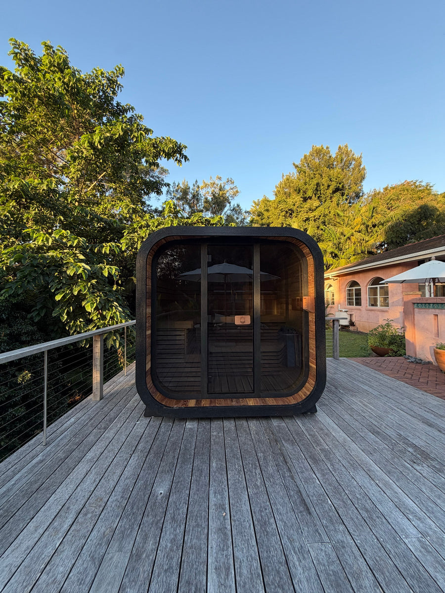 Psycle Wellness Genesis sauna golden hour charcoal exterior cedar interior glow deck Australia - Psycle Wellness Australia