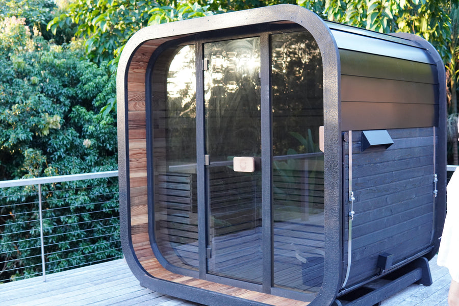 Best outdoor sauna Australia 2026 - Psycle Wellness Genesis sauna Myocum NSW Byron Bay Hinterland charcoal SSB subtropical deck